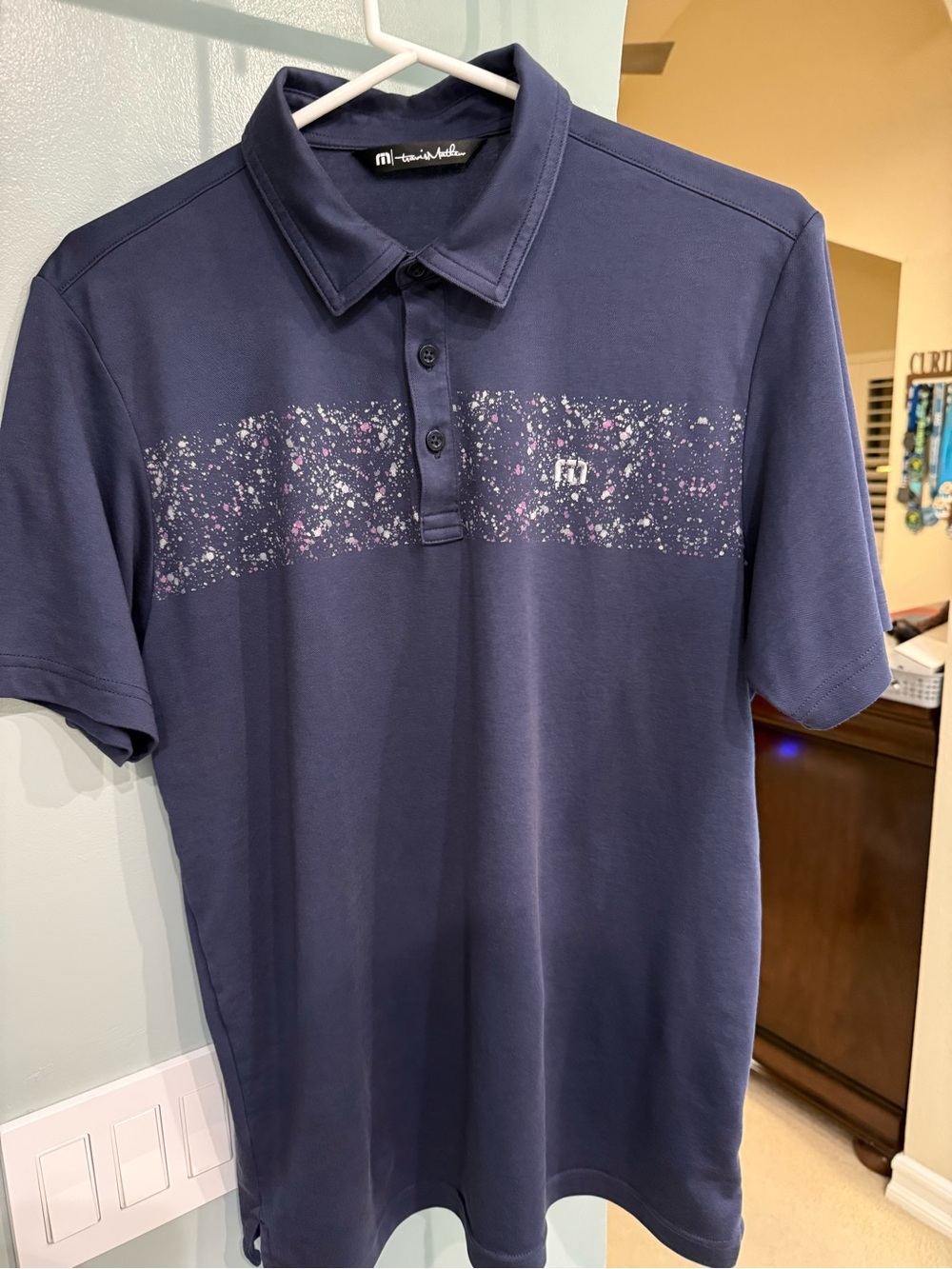 Travis Mathew Navy Polo with Speckled print.  Medium.